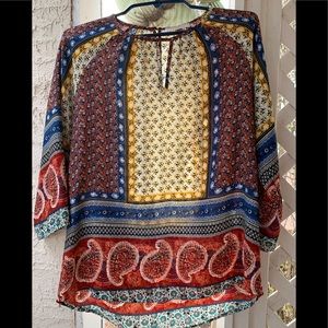 Light weight, 3/4 sleeve blouse.